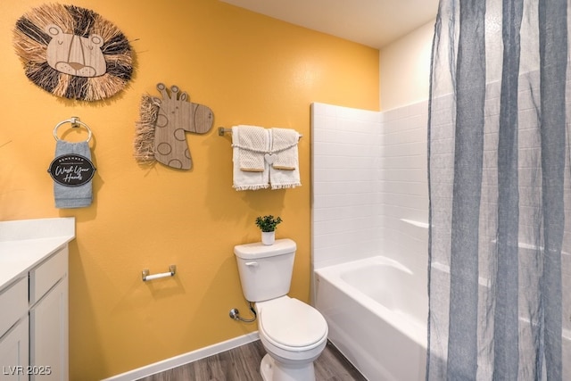 full bathroom featuring wood-type flooring,  shower combination, vanity, and toilet