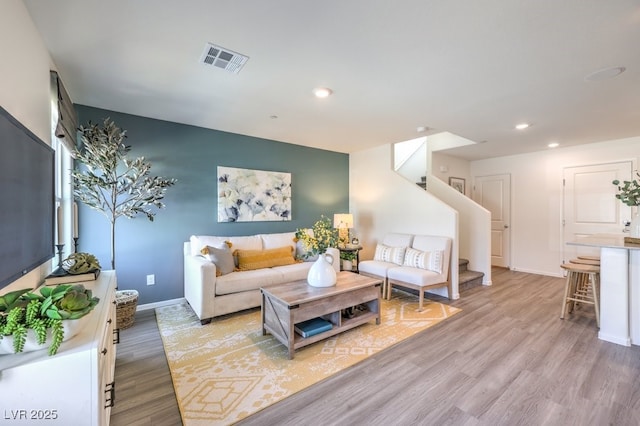 living room featuring light hardwood / wood-style flooring