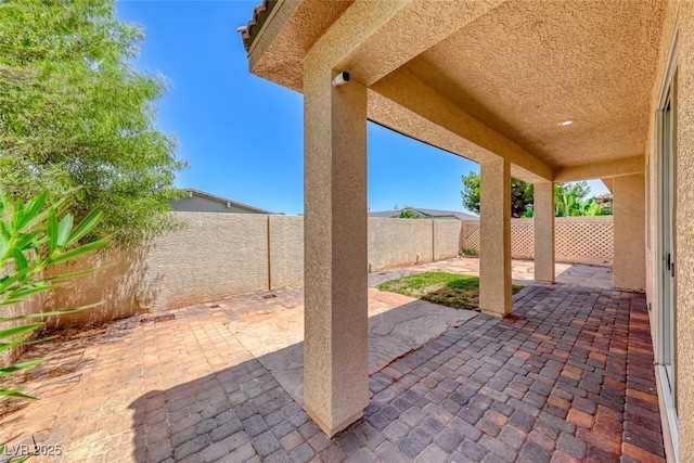 view of patio with a fenced backyard