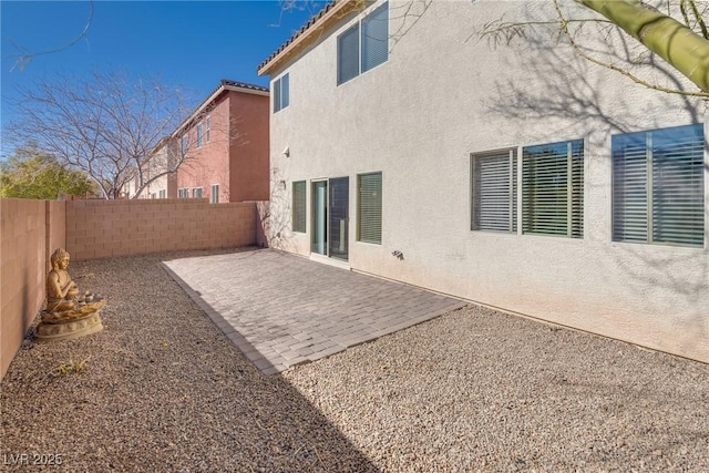 rear view of property with a patio