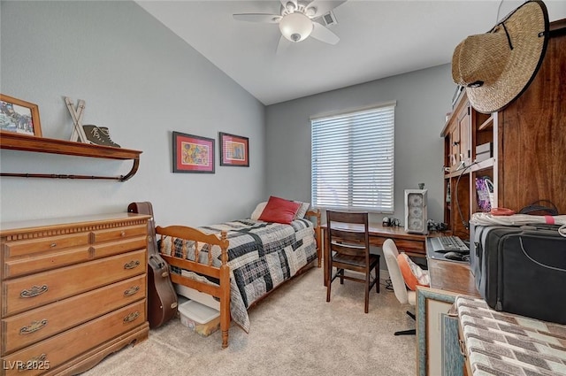 carpeted bedroom featuring vaulted ceiling and ceiling fan