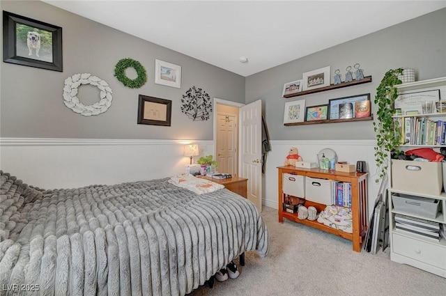 bedroom with light carpet