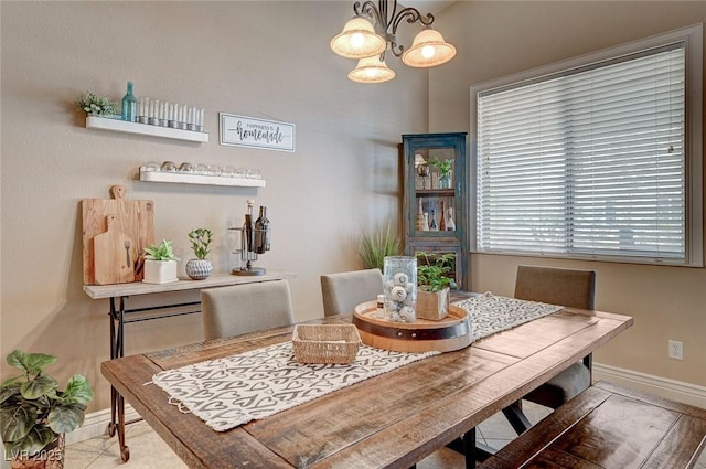 dining room featuring a notable chandelier