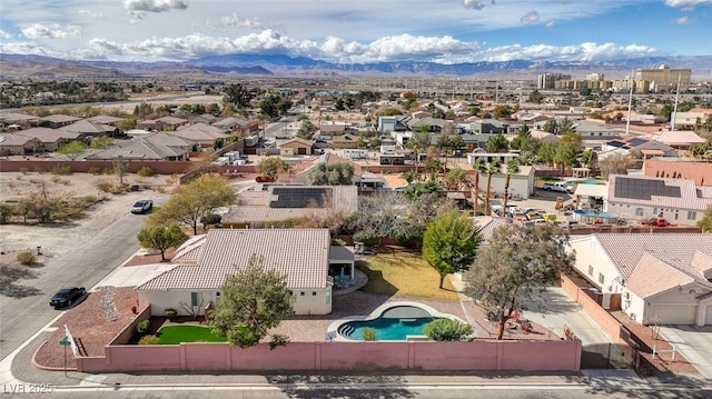 bird's eye view with a mountain view