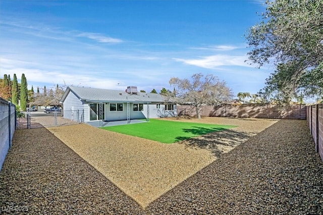 back of house featuring a patio