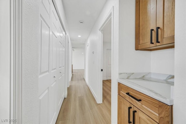 hall featuring light wood-type flooring