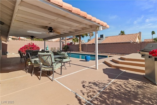 view of pool featuring ceiling fan and a patio area