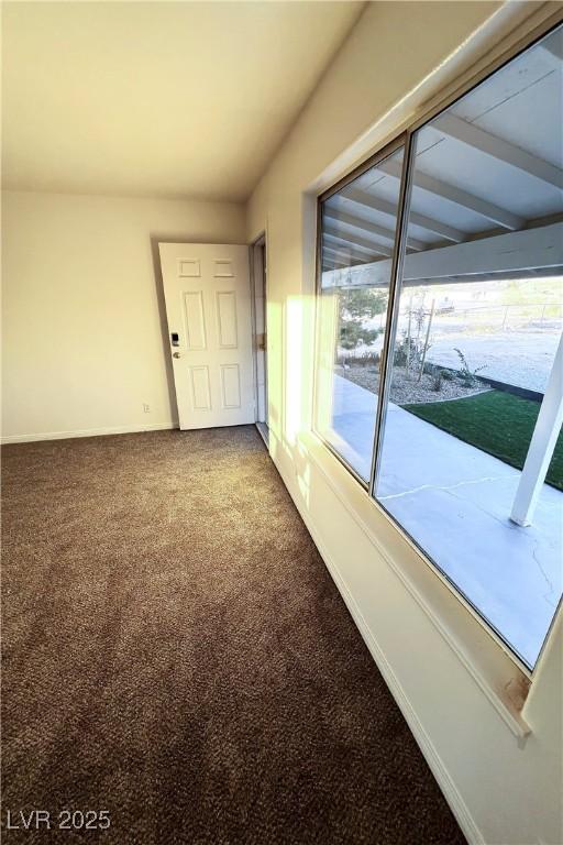 spare room with carpet flooring