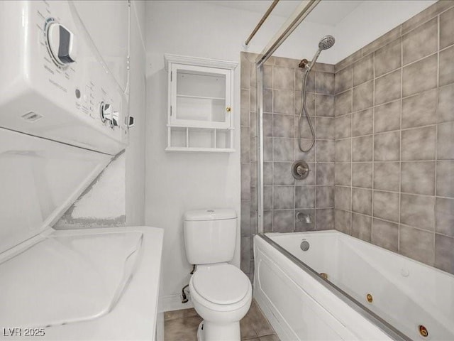 bathroom featuring toilet and shower / bathtub combination