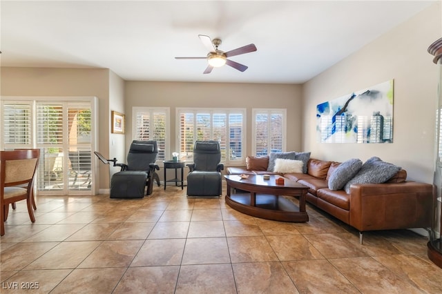 tiled living room with ceiling fan