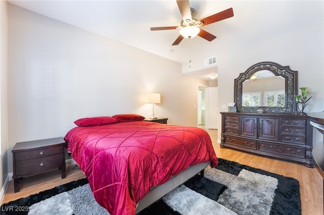 bedroom featuring ceiling fan and light hardwood / wood-style flooring