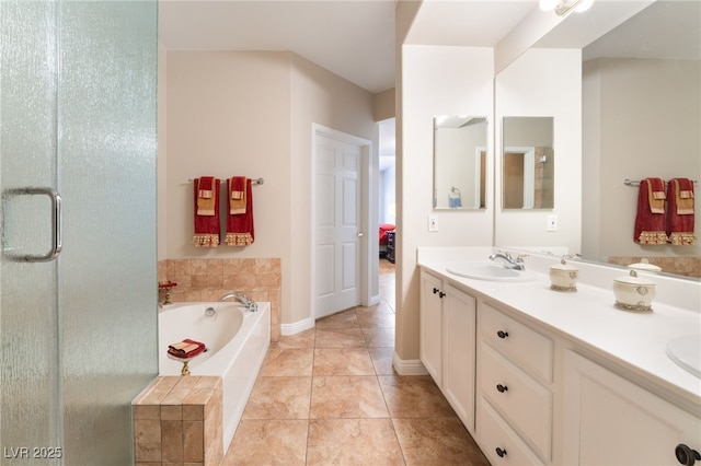 bathroom featuring vanity, tile patterned floors, and separate shower and tub