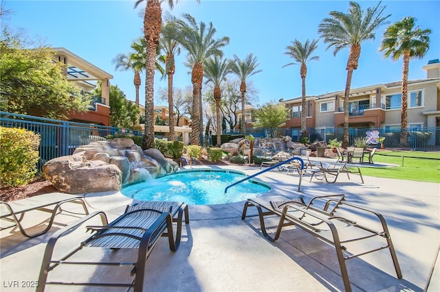 view of pool featuring a patio area