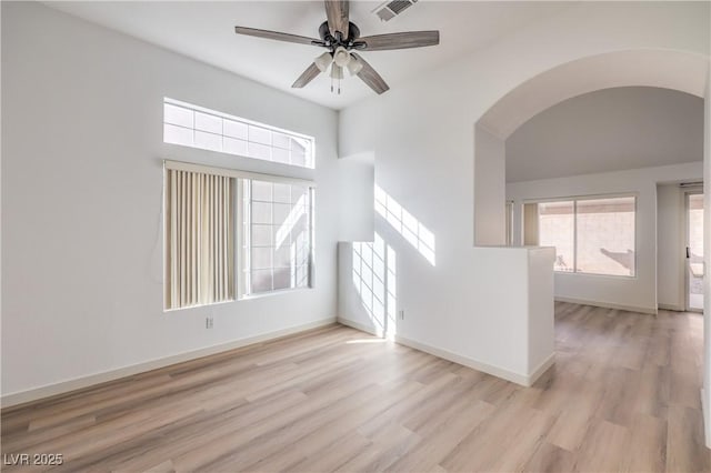 spare room with light hardwood / wood-style flooring and ceiling fan