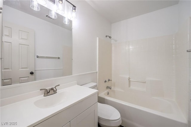 full bathroom featuring vanity, shower / tub combination, and toilet