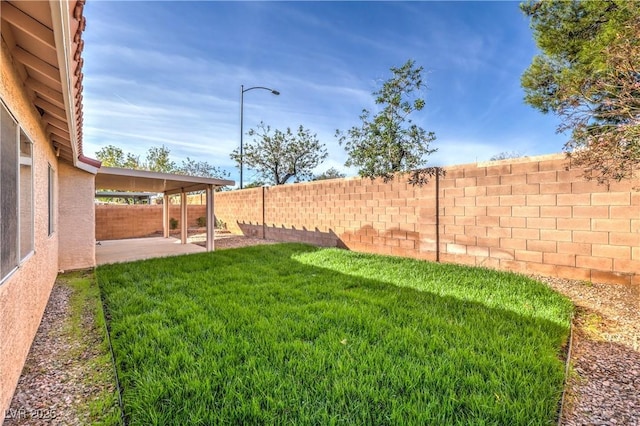 view of yard with a patio area