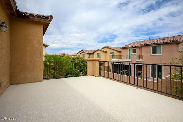 view of patio with a balcony