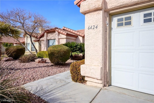 view of home's exterior featuring a garage