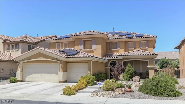 mediterranean / spanish-style home with solar panels