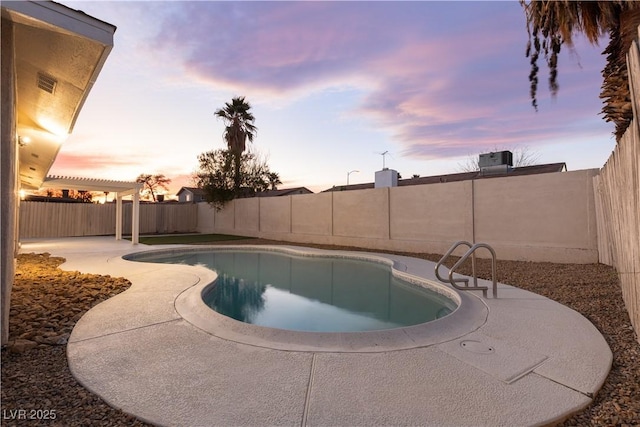 pool at dusk with cooling unit, a pergola, and a patio