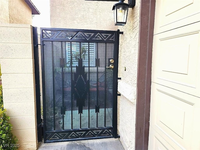 entrance to property with stucco siding