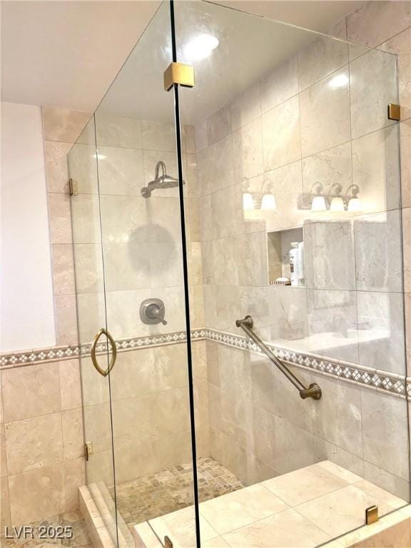 bathroom featuring a stall shower