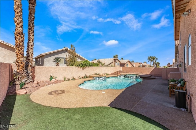 view of swimming pool featuring an in ground hot tub and a patio area