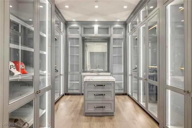 walk in closet featuring light wood-type flooring