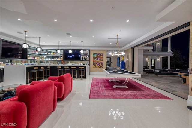 living area with recessed lighting and bar