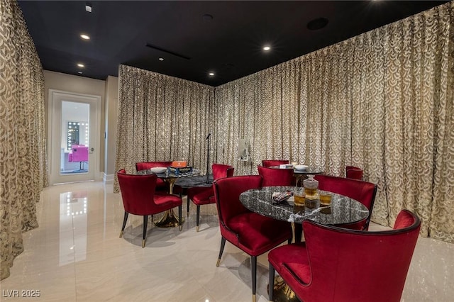 dining area featuring recessed lighting