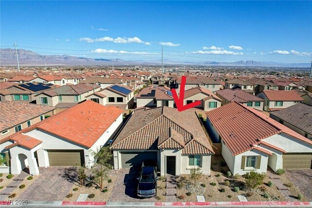 bird's eye view with a mountain view