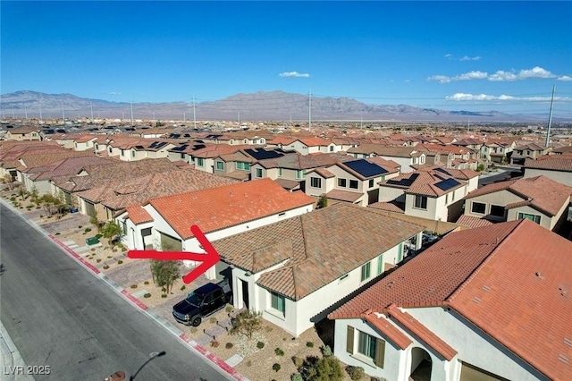 aerial view featuring a mountain view