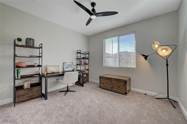 office area with ceiling fan and light colored carpet