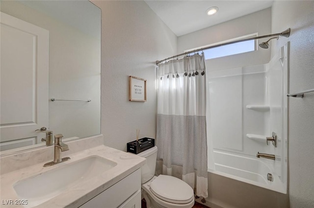 full bathroom with vanity, toilet, and shower / bath combo with shower curtain