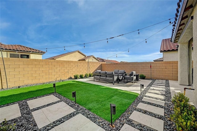 view of yard with outdoor lounge area and a patio area