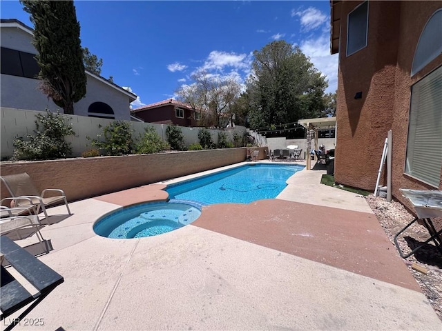 view of swimming pool with a patio area