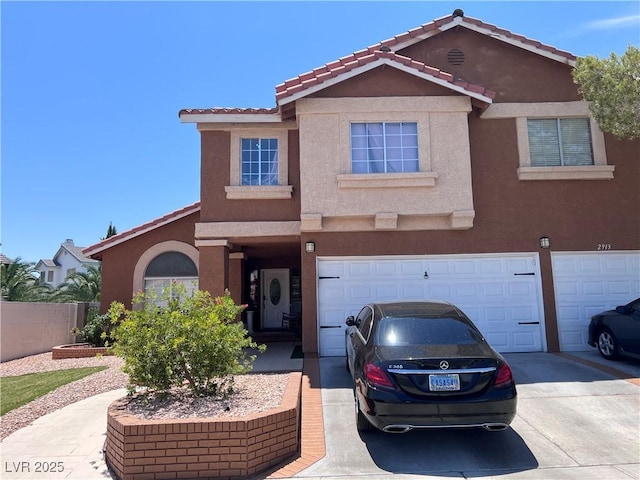 view of front of home with a garage