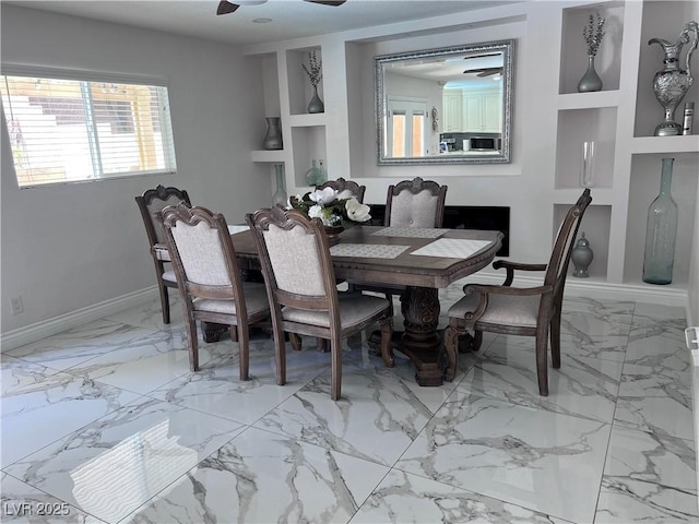 dining area featuring ceiling fan