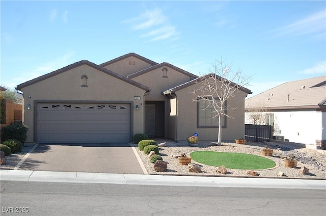 ranch-style house featuring a garage