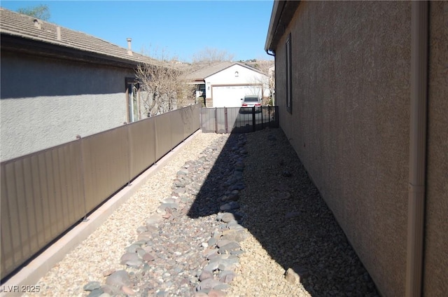 view of yard featuring a garage