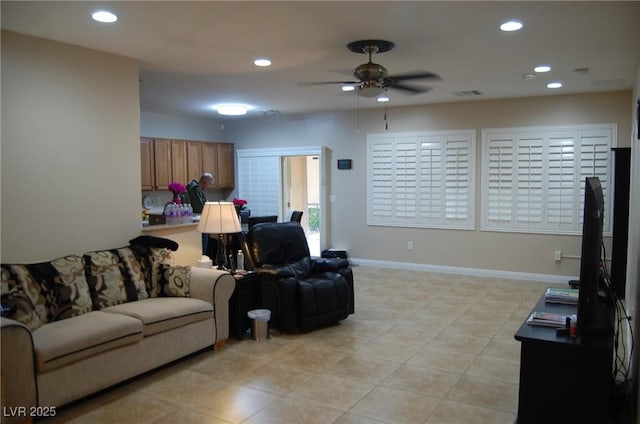 living room with ceiling fan