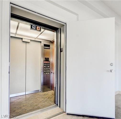 doorway to property with elevator