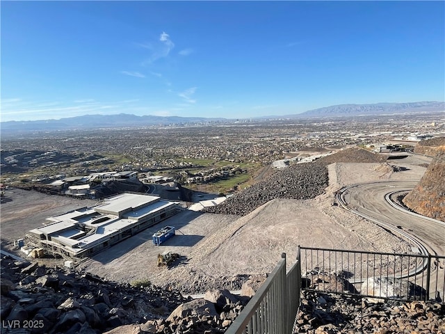 drone / aerial view featuring a mountain view