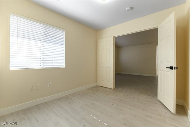 unfurnished room featuring light wood-type flooring