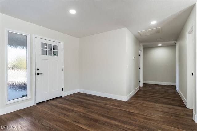 entryway with dark hardwood / wood-style floors