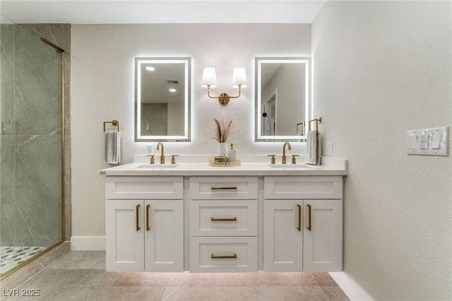 bathroom with vanity and a shower with shower door