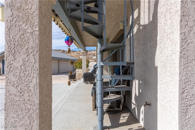 staircase featuring a garage