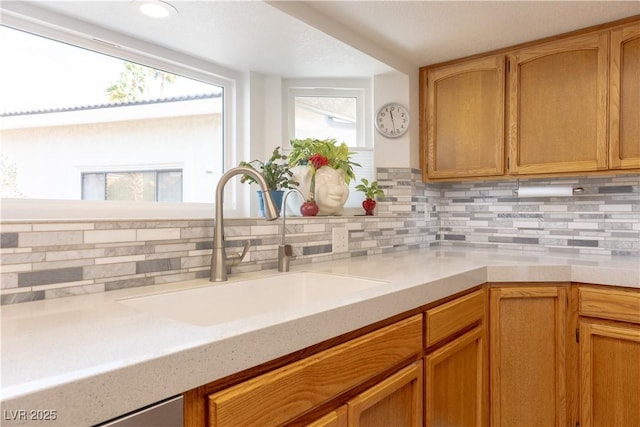 kitchen with sink and backsplash