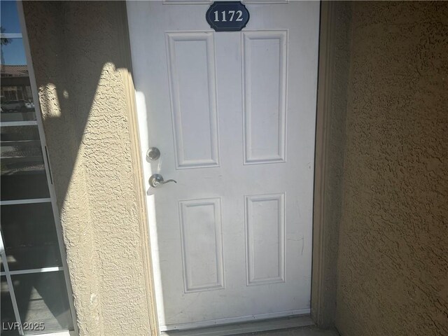 4730 E Craig Rd Unit 1172, Las Vegas, NV 89115 - property entrance featuring stucco siding