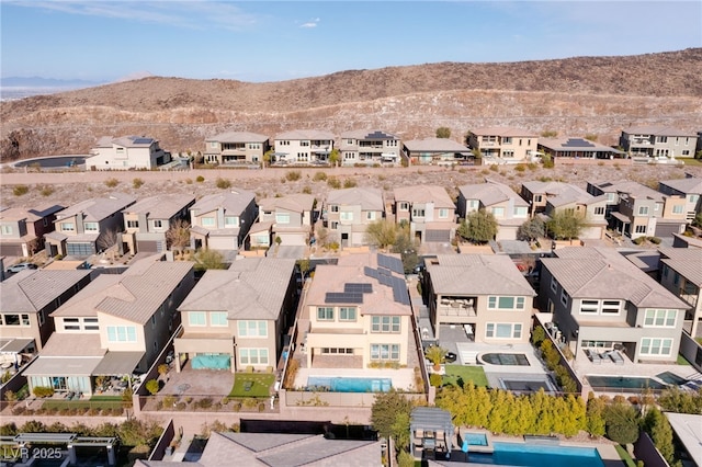 bird's eye view with a mountain view